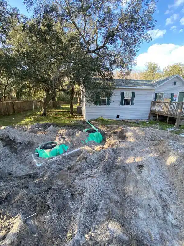 Septic tank in Tampa Fl uncovered while being installed behind a house