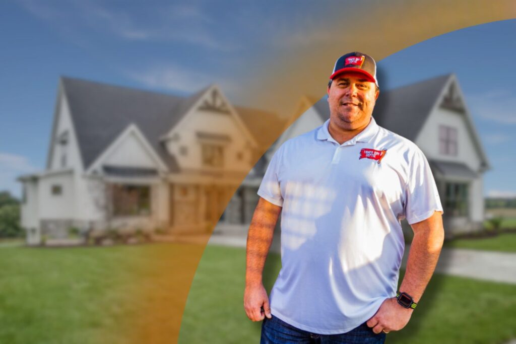 Owner of Tampa Bay Septic, the best septic company in Tampa, standing in front of a residential home.